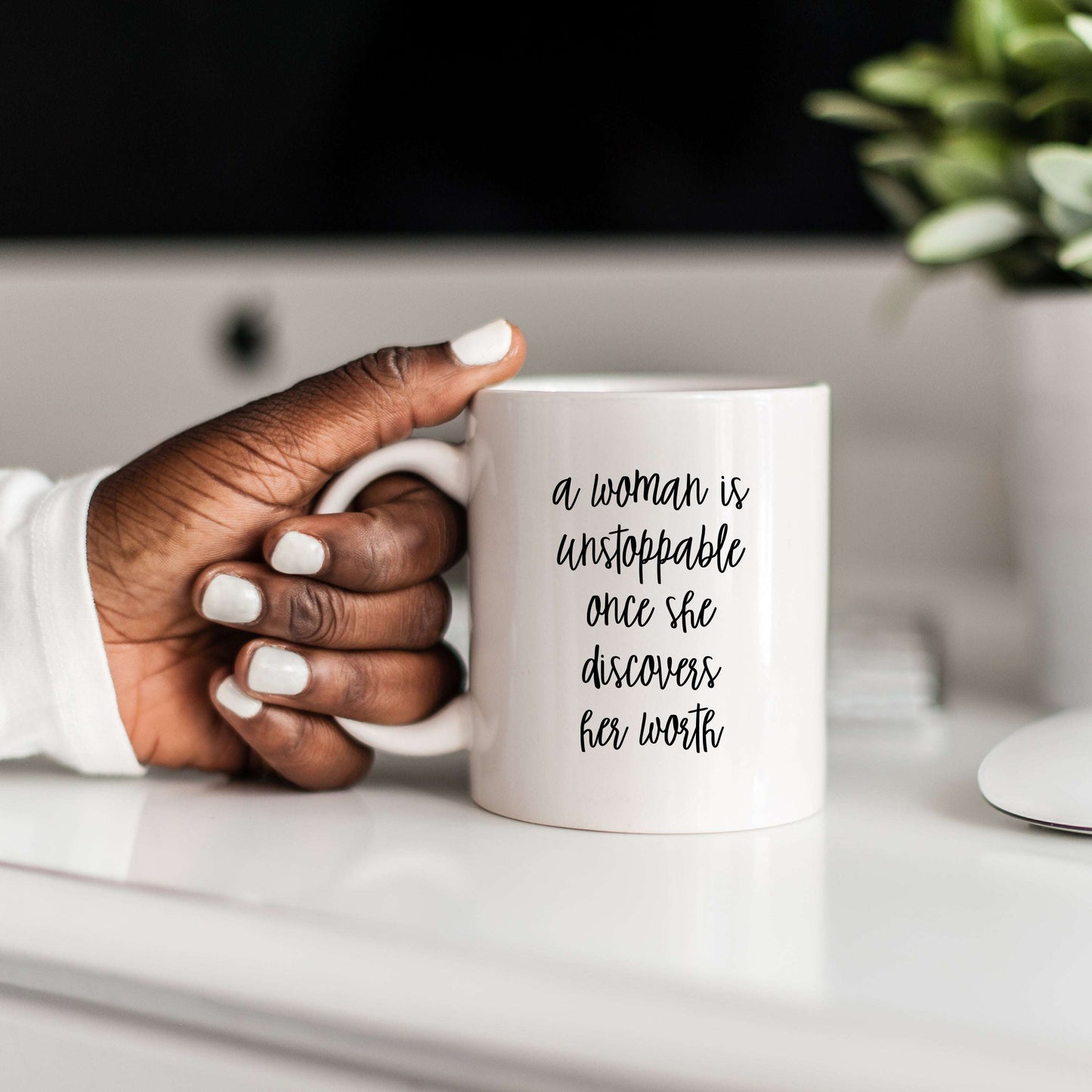 A Woman is Unstoppable Mug