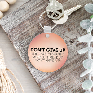 Don't Give Up Keychain