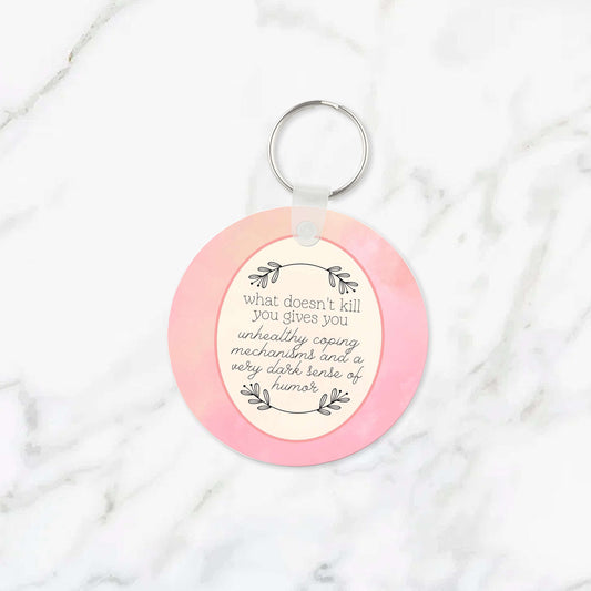 What Doesn't Kill You Dark Humor Keychain